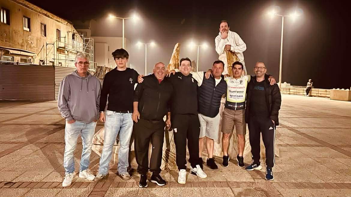 Invite Portugal team gathered outdoors at night